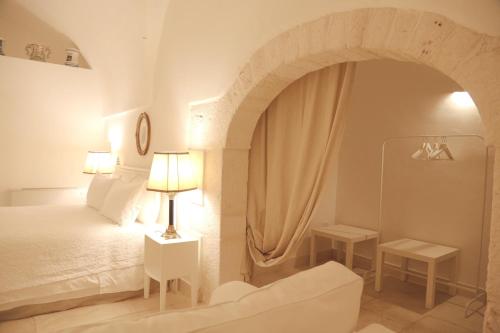 Ein Bett oder Betten in einem Zimmer der Unterkunft Casa d'Autore