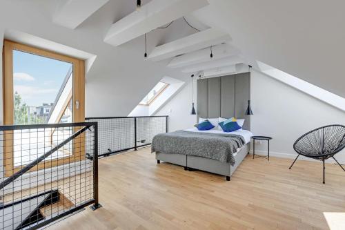 Ένα ή περισσότερα κρεβάτια σε δωμάτιο στο Equus Sopot Apartments