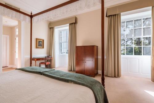 Кровать или кровати в номере Quinta Jardins do Lago