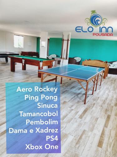 a room with two ping pong tables in it at Pousada Elo Inn in Recife