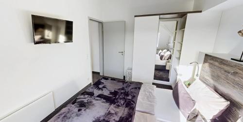 Postel nebo postele na pokoji v ubytování Boardinghouse Emden