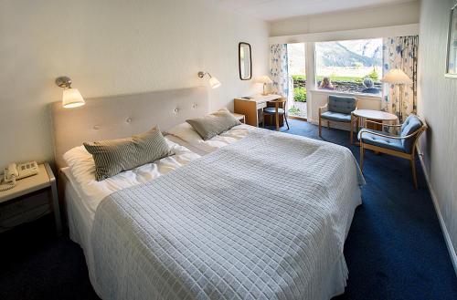 Un ou plusieurs lits dans un hébergement de l'établissement Stalheim Hotel