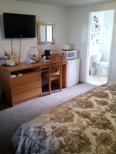 Kuchyň nebo kuchyňský kout v ubytování Holiday Motel Bend