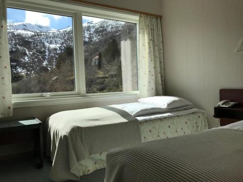 Un ou plusieurs lits dans un hébergement de l'établissement Stalheim Hotel