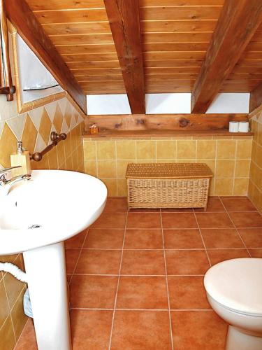 a bathroom with a sink and a toilet at Casa Rural LA FUENTONA in Valle de Tabladillo
