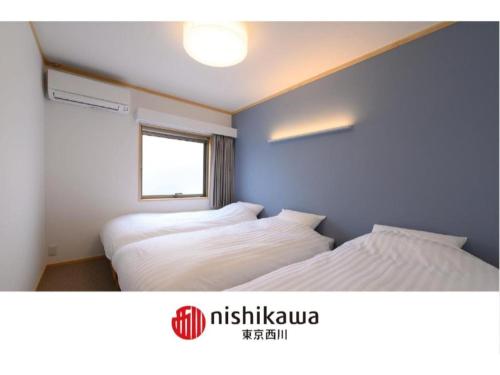 Postel nebo postele na pokoji v ubytování BEYOND HOTEL Takayama 4th - Vacation STAY 82231