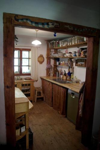 a kitchen with a counter and a counter top at Chalupa Na Košáře in Valašská Senice