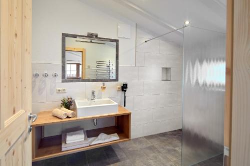 a bathroom with a sink and a mirror at Vordergugg in Mittersill