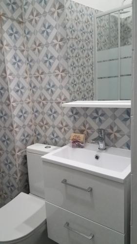 Ένα μπάνιο στο Appart'hotel de la Mairie