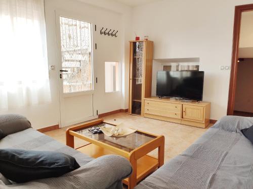 TV a/nebo společenská místnost v ubytování Casa Nadal