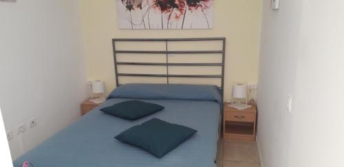 A bed or beds in a room at Sweet House