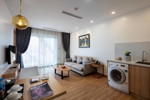 Ruang duduk di The Galaxy Home Hotel & Apartment