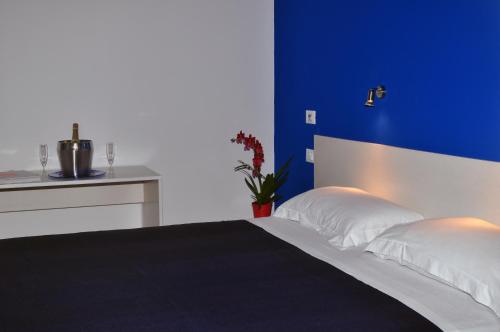 Katil atau katil-katil dalam bilik di Hotel La Punta