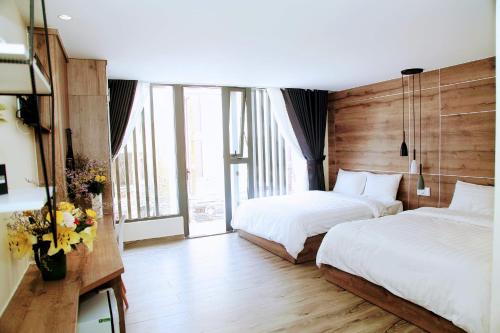 Postel nebo postele na pokoji v ubytování Pontus Hotel