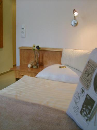 Postel nebo postele na pokoji v ubytování City Hotel by celina