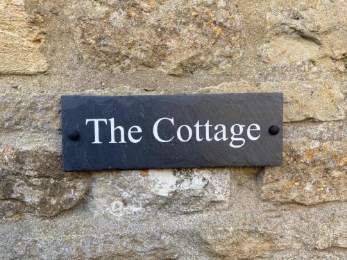 The logo or sign for the vacation home 