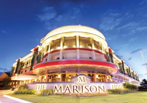 a large building with a marvention sign in front of it at The Marison Hotel in Legazpi