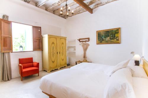 Katil atau katil-katil dalam bilik di Agroturismo Son Sant Andreu
