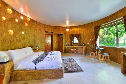 Voodi või voodid majutusasutuse Theerama Cottage toas