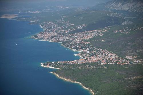 an aerial view of a town next to a body of water at Apartments Adriatic in Selce