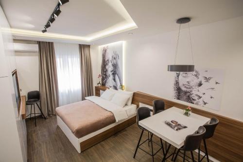 Cama o camas de una habitación en SACHER APARTMENTS