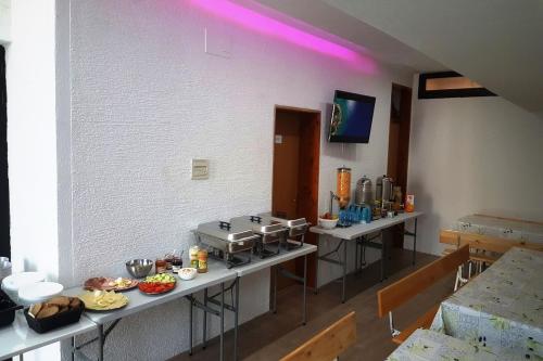a kitchen with a counter with food on it at Apartments Adriatic 2 in Selce