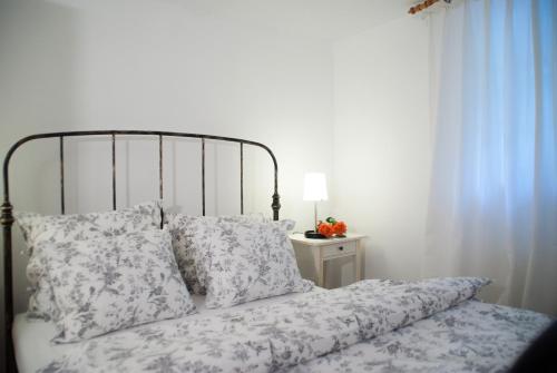 Ένα ή περισσότερα κρεβάτια σε δωμάτιο στο AmKapuziner Apartments