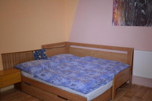 Postel nebo postele na pokoji v ubytování Ubytování U Součků Jindřichův Hradec