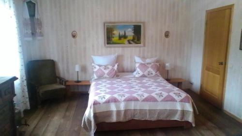 
Кровать или кровати в номере Guest house Usadba Surikova
