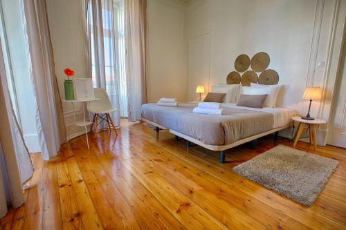 Ένα ή περισσότερα κρεβάτια σε δωμάτιο στο Chalet D´Ávila Guest House