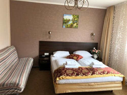 Postel nebo postele na pokoji v ubytování Atlas Berlin Hotel