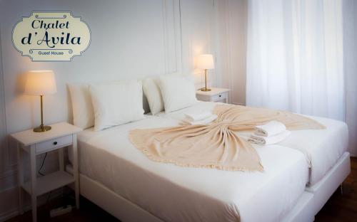 Ένα ή περισσότερα κρεβάτια σε δωμάτιο στο Chalet D´Ávila Guest House