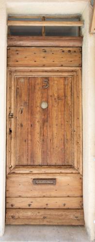 a wooden door with a handle on top of it at MAISON PICASSO - Jacuzzi, vue, terrasse for 6 in Antibes