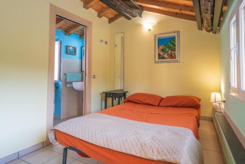 Una cama o camas en una habitación de Cà du Nilo