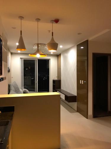a kitchen with two pendant lights and a counter top at SHP Plaza Khanh Phong Homestay in Hai Phong