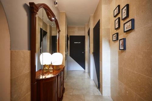 Een badkamer bij BUBUFLATS / Mercat