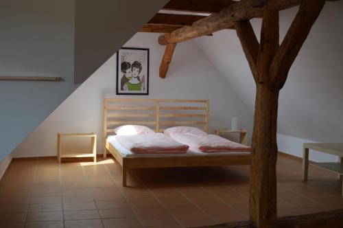 Postel nebo postele na pokoji v ubytování Ubytování U Zimů