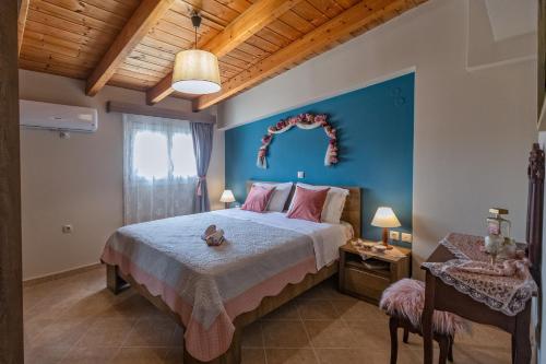 Posteľ alebo postele v izbe v ubytovaní Nefeli seaview apartment