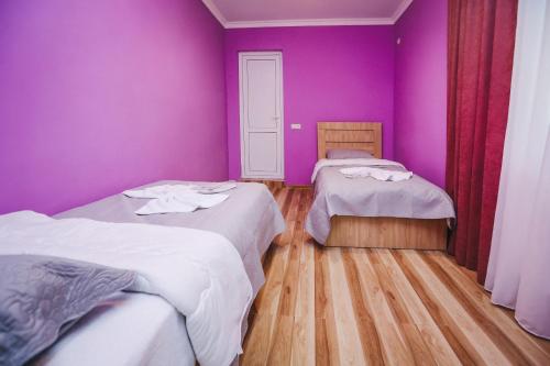Ένα ή περισσότερα κρεβάτια σε δωμάτιο στο Bebo Babu Guest House