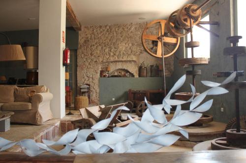 a living room with a lot of white paper sculptures at Hotel Boutique Moli El Canyisset in Gandía