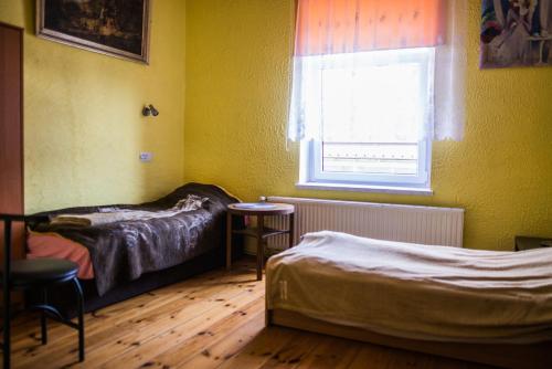 Postel nebo postele na pokoji v ubytování Noclegi na Polnej