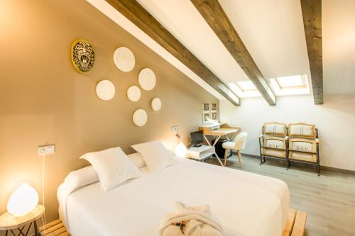 Ένα ή περισσότερα κρεβάτια σε δωμάτιο στο Teatrisso Hotel Palacio