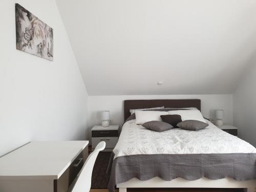 Postel nebo postele na pokoji v ubytování Apartment Asgard