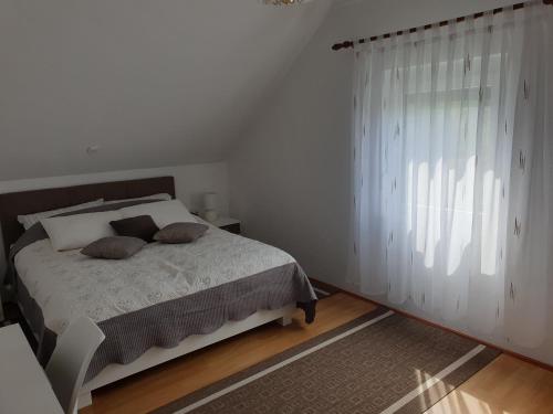 Postel nebo postele na pokoji v ubytování Apartment Asgard
