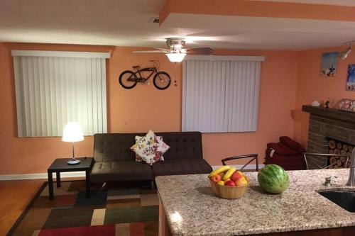 a living room with a couch and a table at Cozy retreat in sunny Florida in Sarasota