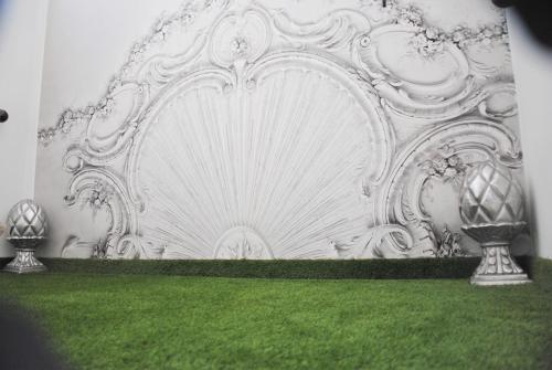 Un jardín fuera de Hotel Hubertus