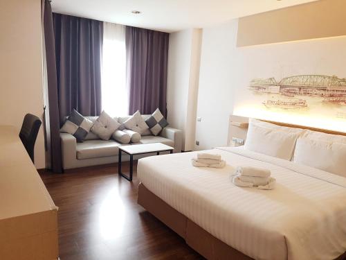 Katil atau katil-katil dalam bilik di Parinda Hotel