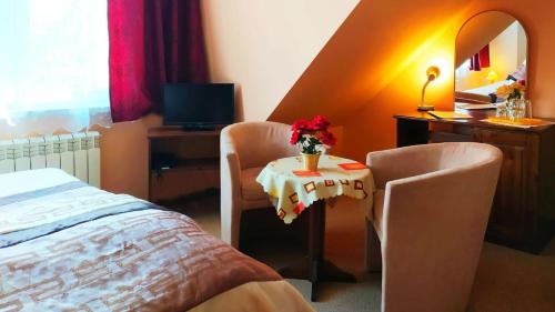 Katil atau katil-katil dalam bilik di Hotel Restauracja Kwisa 1
