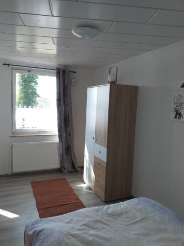 Ένα ή περισσότερα κρεβάτια σε δωμάτιο στο Bungalow 2 am Donnerberg in Sewekow