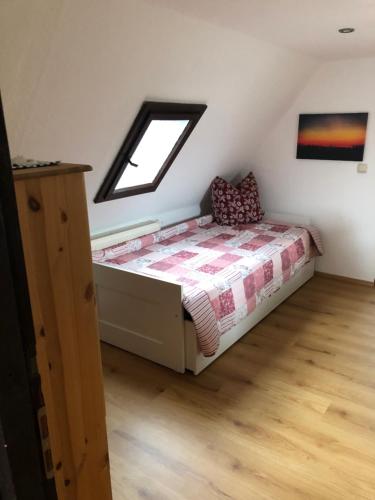 Letto o letti in una camera di Ferienhaus zentral & grün